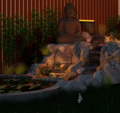 Un bouddha avec une cascade qui ruisselle jusqu'à un petit bassin